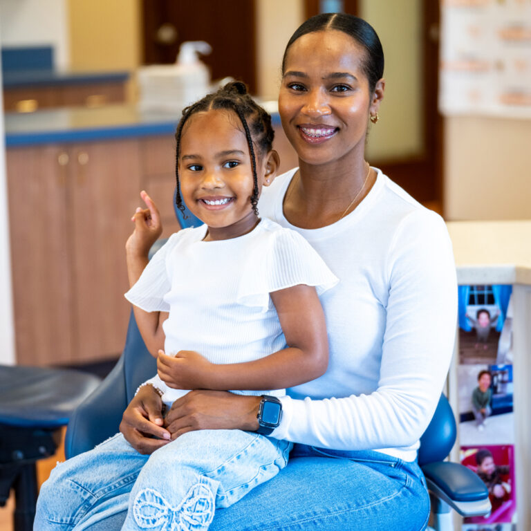 Smiling Mother And Daughter Patients